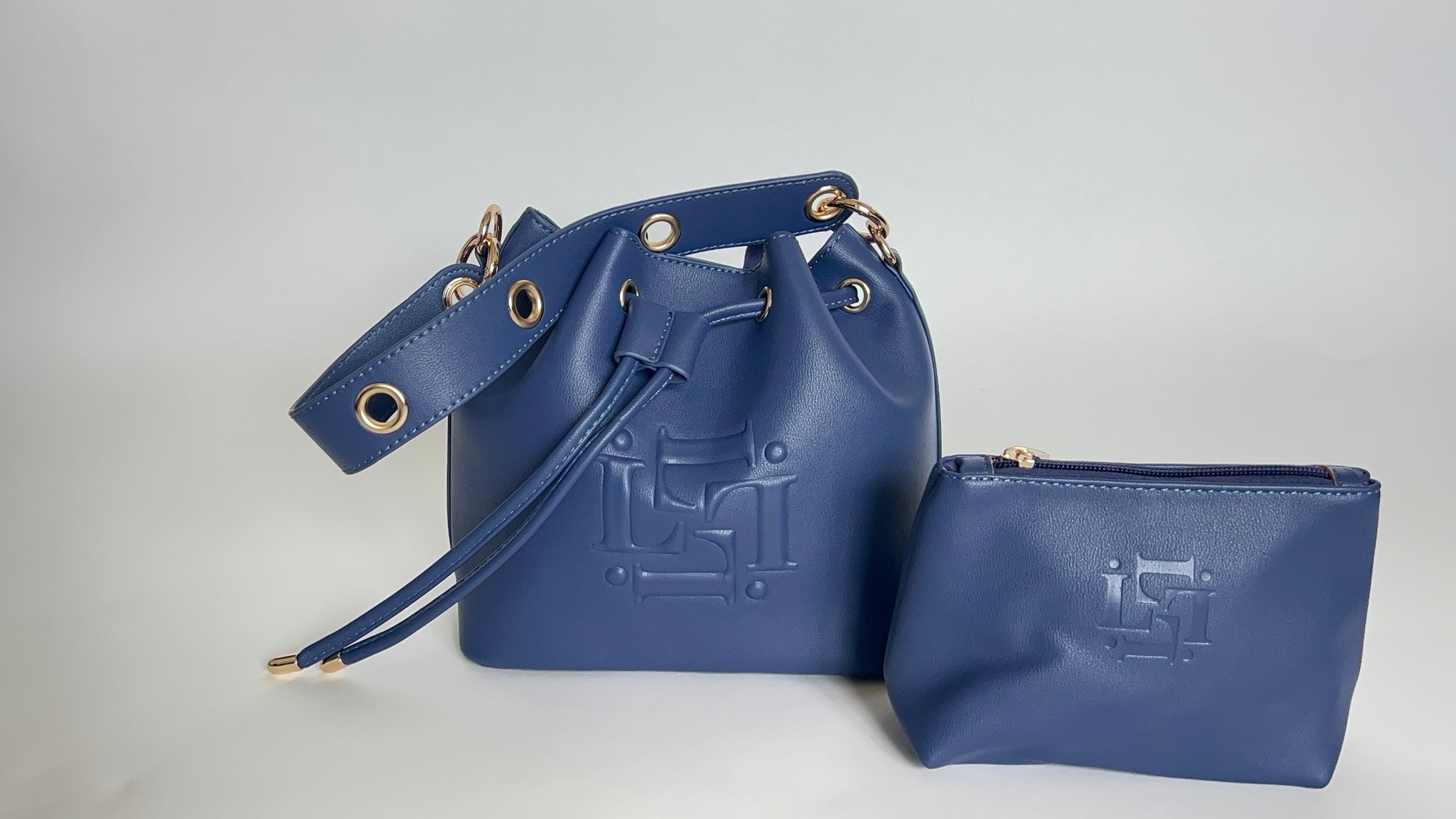 The Bucket bag, Marc Jacobs bucket bags, Steve madden bags,Brandon Blackwood bags,navy blue bucket bags, black owned handbags,vegan leather bags,Amazon,Walmart bags , Navy blue crossbody, Navy blue handbags, Women Owned Handbags, Vegan leather blue bags, fall 2022 fashion bucket bags, Tory burch hand bags